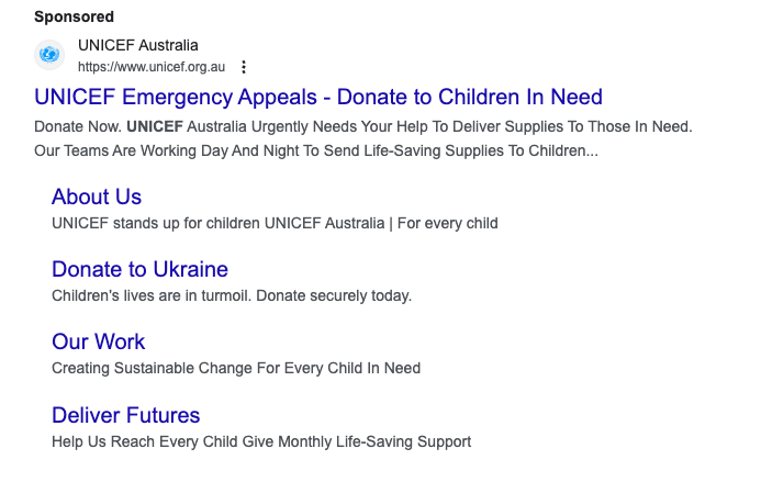 UNICEF Australia paid search ad with sitelink extensions visible